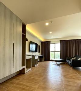 TV a/nebo společenská místnost v ubytování Long Fu Hotel