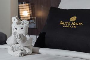 Postel nebo postele na pokoji v ubytování Brits Hotel Legian