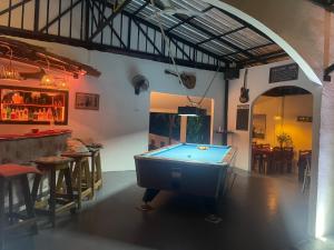a pool table in a room with a bar at Lonely Beach Pool Resort in Ko Chang