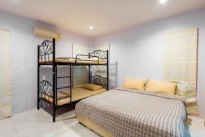 Postel nebo postele na pokoji v ubytování KiengTalay Pool Villa Huahin + 22 fotografií