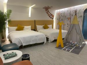 Säng eller sängar i ett rum på Ya Nold Hot Spring Hotel