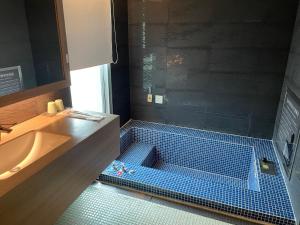 Vannituba majutusasutuses Ya Nold Hot Spring Hotel