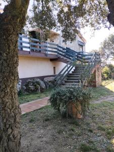 A garden outside Casa adossada de camp prop de la Costa Brava
