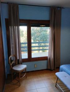 A bed or beds in a room at Casa adossada de camp prop de la Costa Brava