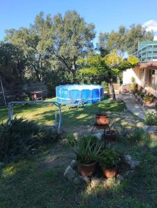 A garden outside Casa adossada de camp prop de la Costa Brava