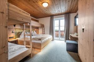 Postel nebo postele na pokoji v ubytování Jugendhotel Gruber