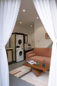 Ruang duduk di Quang Vinh Apartment and Hotel Hoi An