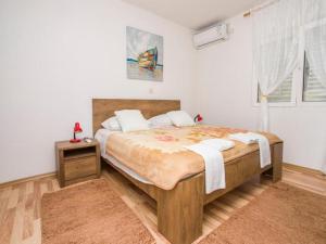 Postel nebo postele na pokoji v ubytování Apartment PASCAL