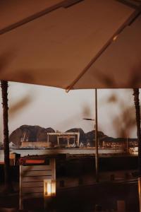 a view of a city with smoke in the distance at Le Rose Thé in La Ciotat