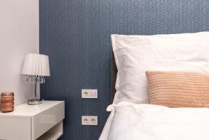 Posteľ alebo postele v izbe v ubytovaní ASSEA Elegant Apartment with 2 Bedroom in Downtown + 8 fotografií
