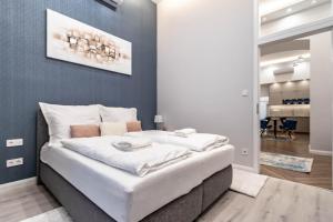Posteľ alebo postele v izbe v ubytovaní ASSEA Elegant Apartment with 2 Bedroom in Downtown