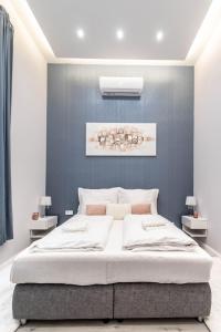 Posteľ alebo postele v izbe v ubytovaní ASSEA Elegant Apartment with 2 Bedroom in Downtown