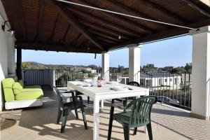 En balkon eller terrasse på Marina Home Holiday
