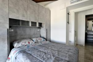 Ένα ή περισσότερα κρεβάτια σε δωμάτιο στο Pasquale Home Holiday