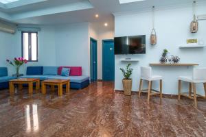 TV a/nebo společenská místnost v ubytování Kahlua Hotel Apartments