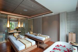 Postel nebo postele na pokoji v ubytování Mason Pine Hotel Bandung