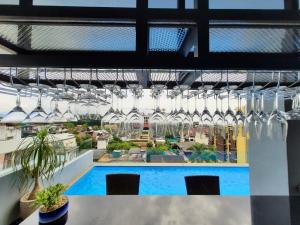 a view of a pool in a building at Ama's House Luxury Boutique Hotel in Chiang Mai