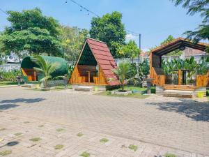 Zahrada ubytování RedDoorz Syariah at Mojosari