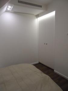 Postel nebo postele na pokoji v ubytování Erkel Rooftop Suites