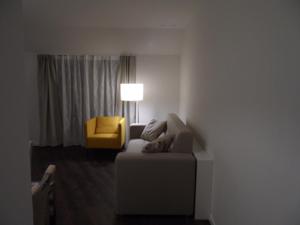 Posezení v ubytování Erkel Rooftop Suites