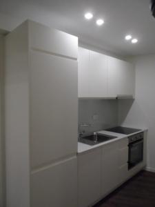 Kuchyň nebo kuchyňský kout v ubytování Erkel Rooftop Suites