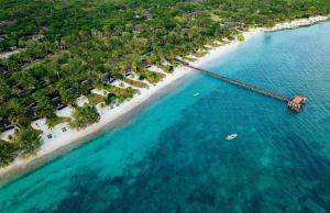an aerial view of a bridge over a beach at The Residence Zanzibar in Kizimkazi
