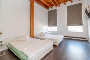 Posteľ alebo postele v izbe v ubytovaní Maison d’Architecte - Magnifique volume
