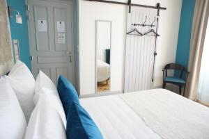 Postel nebo postele na pokoji v ubytování MAS TERRE Chambres d'Hôtes