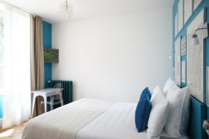 Postel nebo postele na pokoji v ubytování MAS TERRE Chambres d'Hôtes