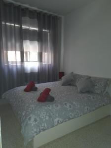 Letto o letti in una camera di Gozo Marsalforn