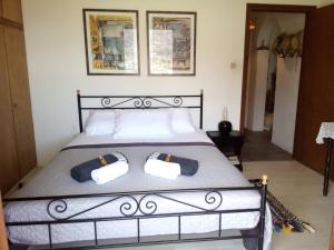 En eller flere senge i et værelse på Irene Asklipios Paros