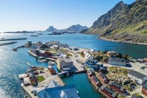 an aerial view of a small town on a body of water at Lofoten- Fishermans logde with the view in Stamsund