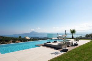 Villa Niolos II في Stérnai: فيلا بمسبح وإطلالة +49 صورة