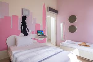 Postel nebo postele na pokoji v ubytování Luxury Villa Alba by Estia