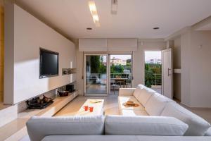 TV a/nebo společenská místnost v ubytování Luxury Villa Alba by Estia