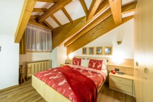 Postel nebo postele na pokoji v ubytování Alpstyle Hotel Albolina Wellness & Beauty