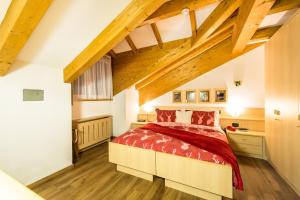 Postel nebo postele na pokoji v ubytování Alpstyle Hotel Albolina Wellness & Beauty