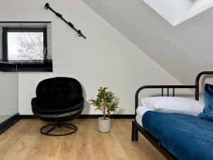 Posteľ alebo postele v izbe v ubytovaní Apartamenty Maxa Czornyja