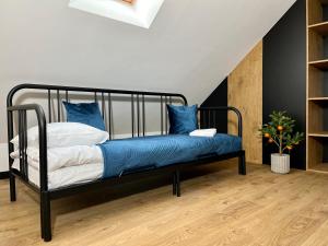 Posteľ alebo postele v izbe v ubytovaní Apartamenty Maxa Czornyja