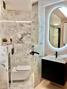 Kúpeľňa v ubytovaní Apartamenty Maxa Czornyja
