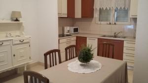 Kuchyň nebo kuchyňský kout v ubytování Apartment in Vodice with terrace, air conditioning, W-LAN, washing machine 3671-6 + 12 fotografií
