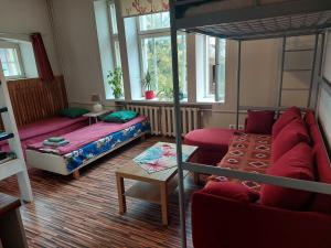 Postel nebo postele na pokoji v ubytování Looming Hostel