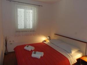 Posteľ alebo postele v izbe v ubytovaní Apartment in Dramalj with sea view, balcony, air conditioning, WiFi 4623-9