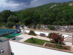 Bazén v ubytovaní Apartment in Dramalj with sea view, balcony, air conditioning, WiFi 4623-9 alebo v jeho blízkosti
