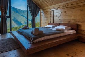 Voodi või voodid majutusasutuse Hill Inn toas