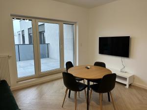 Telewizja i/lub zestaw kina domowego w obiekcie Apartament Metropolis 15
