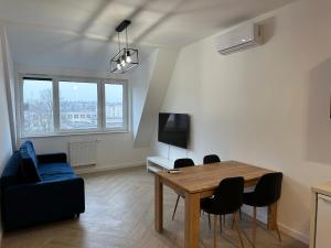 Telewizja i/lub zestaw kina domowego w obiekcie Apartament Metropolis 15