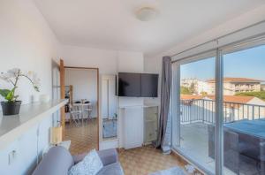 Balkón alebo terasa v ubytovaní La Terrasse - proche gare et centre ville, parking -