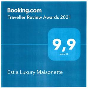 un recuadro de texto azul con los premios de revisión de viajes en él en Estia Luxury Maisonette en Pafos