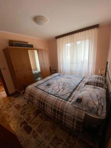 A bed or beds in a room at Girasole Még 21 kép